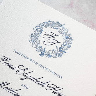Custom monogram with floral wreath design for floral letterpress invitation suite