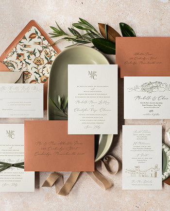 Custom wedding letterpress invitation suite with custom envelope liner, monogram and venue illustrations