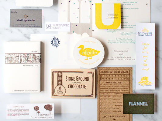 assortment of letterpress business cards, booksmarks, gift tags, corporate stationery, coasters, and gift certificates
