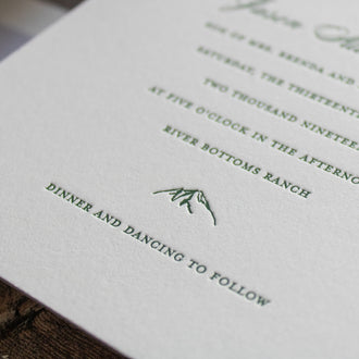 Pastoral letterpress wedding invitations, mountain detail